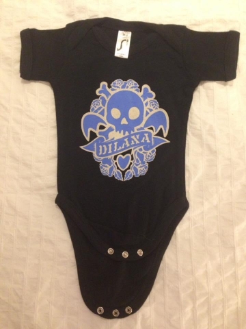 Dilana baby onesie, available in sizes from 12 to 23 months old